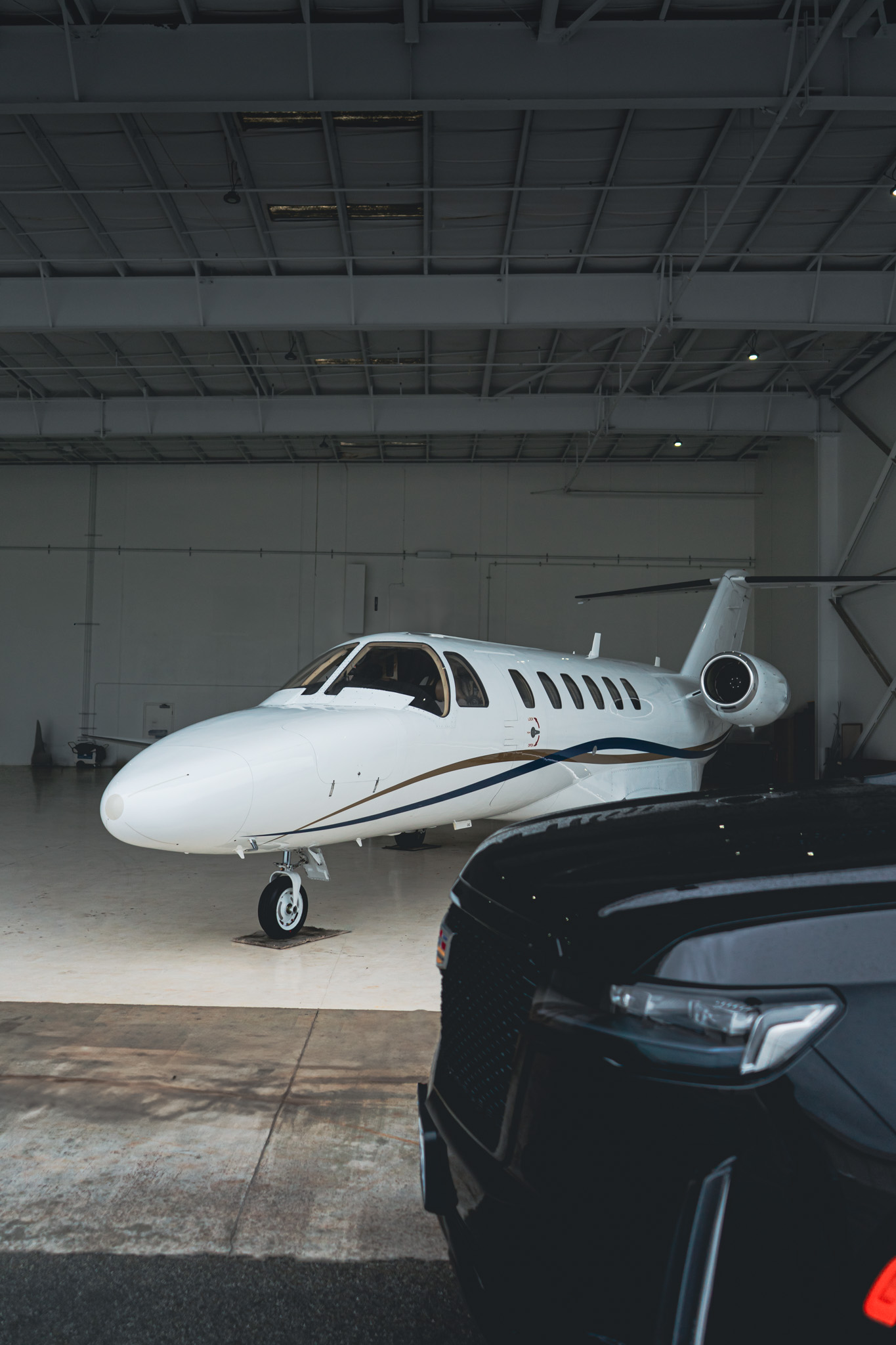 Citation Aircraft and Cadillac Escalade